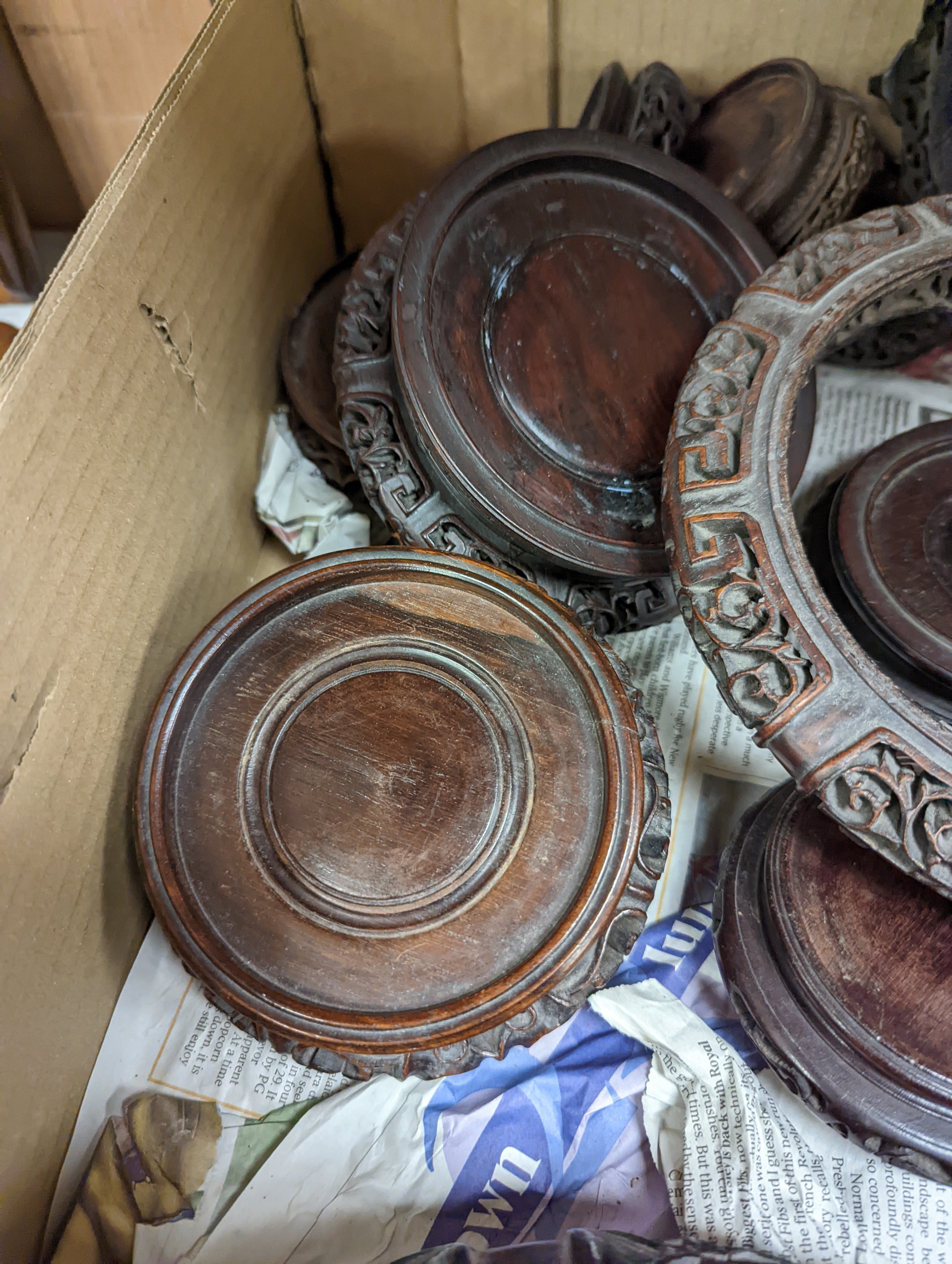A collection of Chinese hardwood stands, largest 23. 5 cm